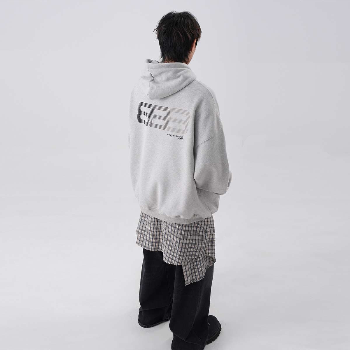  ゆったりシルエットのロゴ入りパーカー
